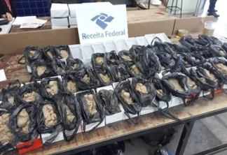 Receita Federal encontra areia dentro de caixas de celulares apreendidos
