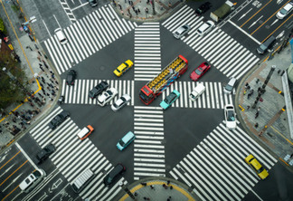TOKYO, JAPAN - OCTOBER 2017 : Top view of Undefined Japanese people crowd are walking to crosses the street between the buildings of Ginza JR station which is district on October 28, 2017 in Tokyo, Japan.