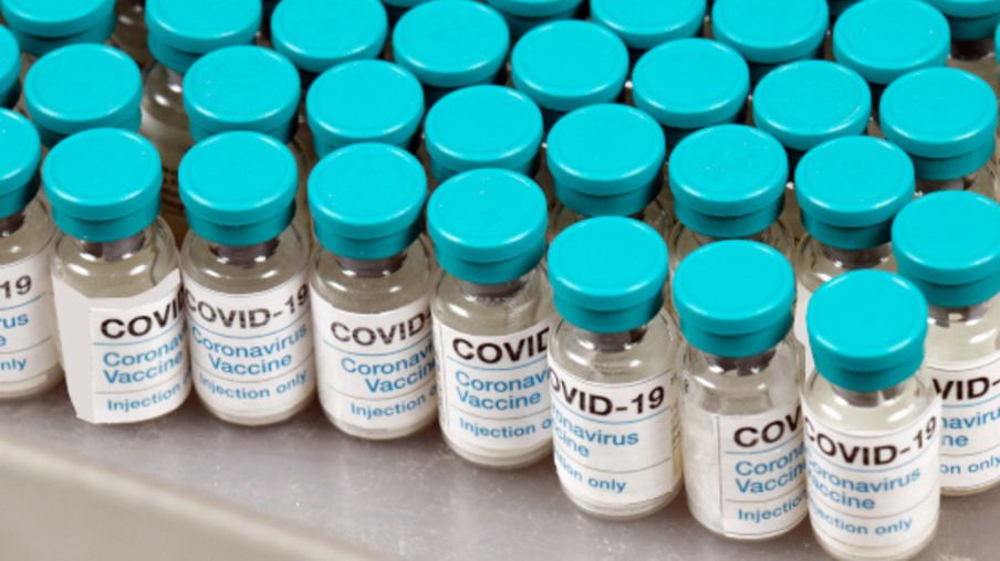 Covid-19 vaccines on laboratory shelf